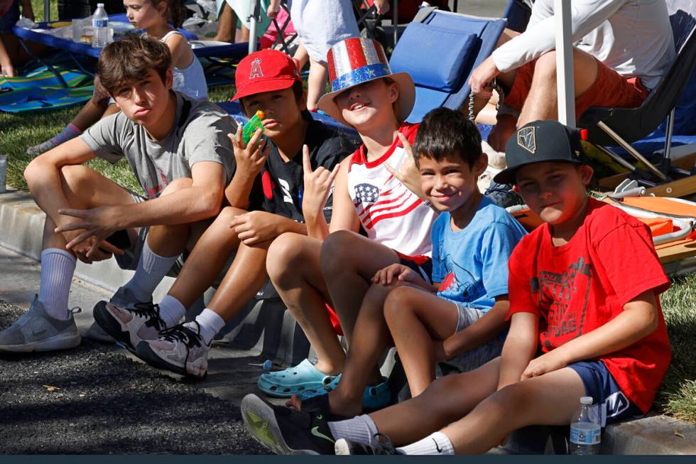 Children pose for a photo during the 28th Annual Summerlin Council Patriotic Parade, Monday, Ju ...