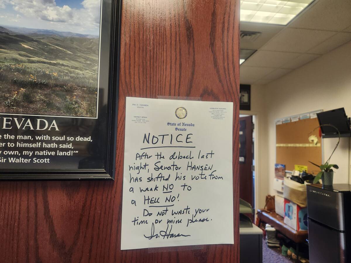 A notice posted on the door of Sen. Ira Hansen, R-Sparks, in Carson City on June 7, 2023. (Jess ...