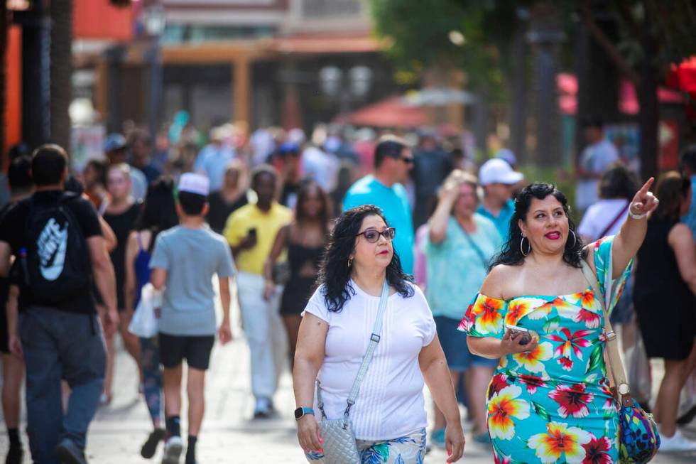 Tourists walk through the strip on Friday, June 2, 2023, in Las Vegas. (Daniel Pearson/Las Vega ...