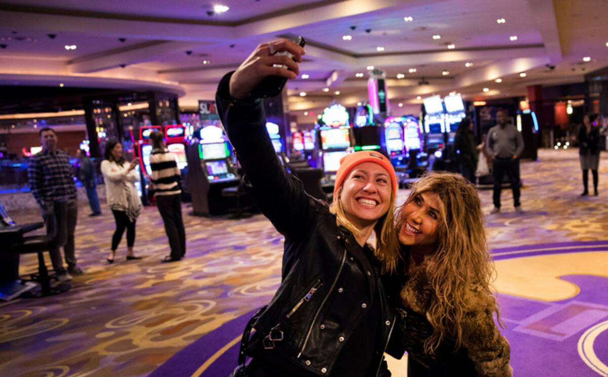 Liinda Garisto, left, and Esmeralda Walters pose for a selfie at the Hard Rock casino in Las Ve ...