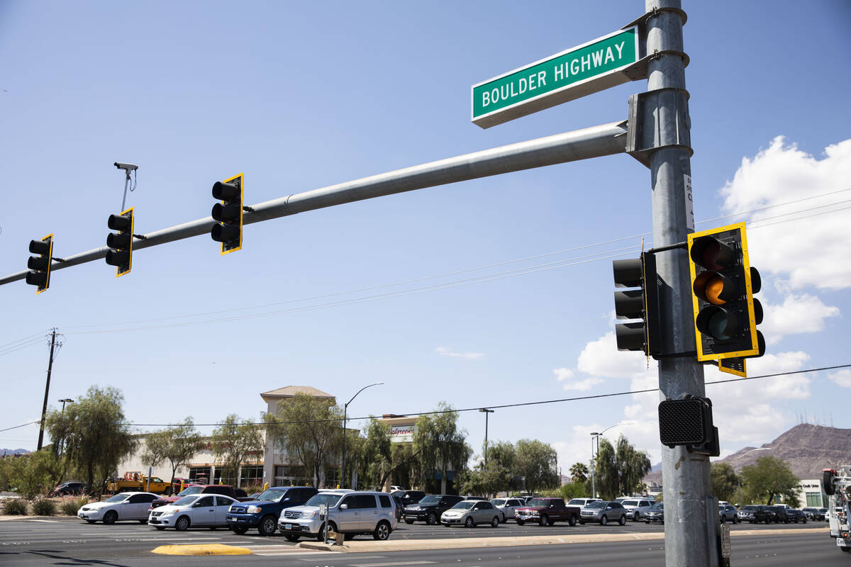 A line of cars are backed up at a traffic light at the intersection of Boulder Highway and Lake ...