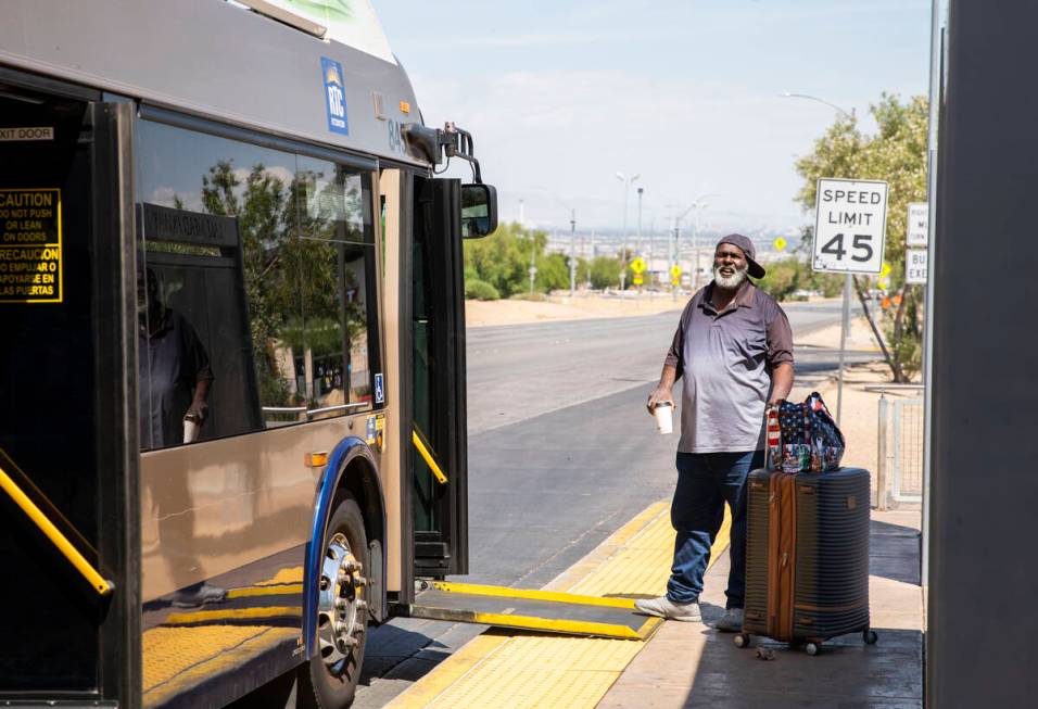 A man prepares to board a bus traveling along Boulder Highway on Thursday, June 8, 2023, in Hen ...