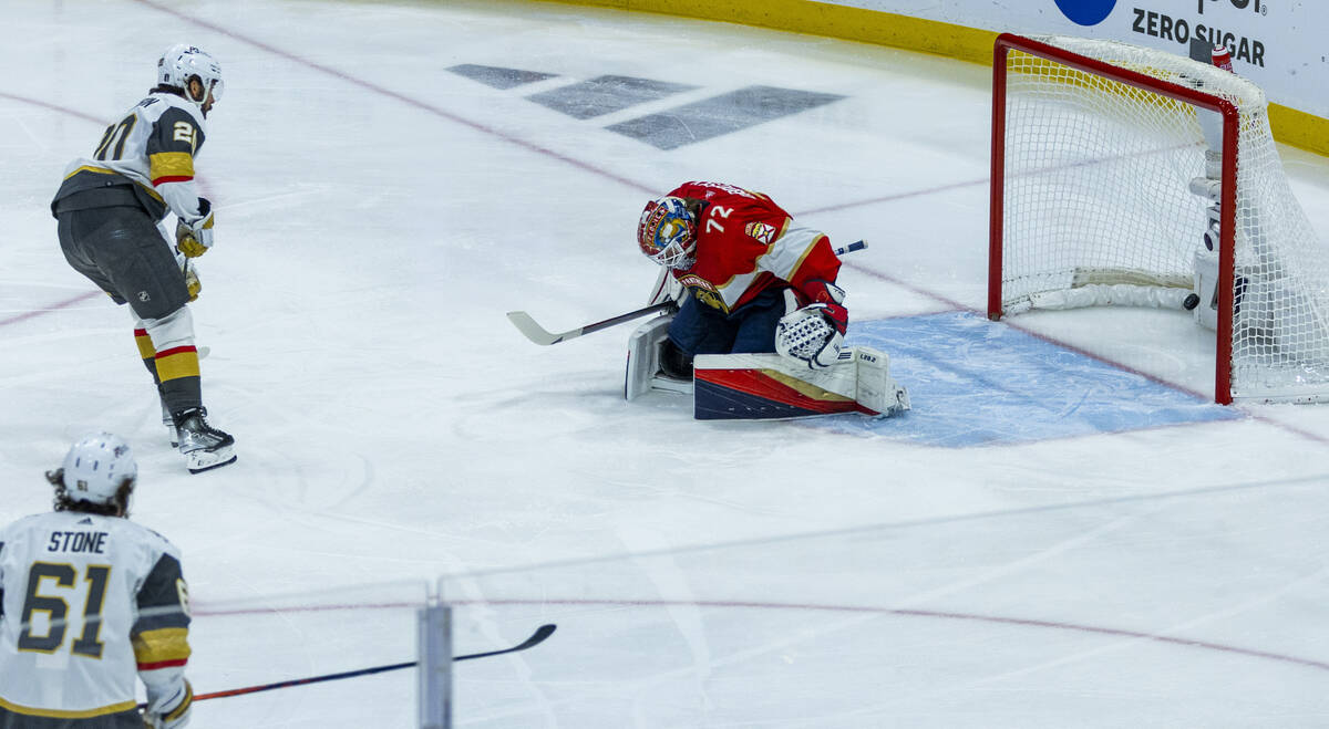 Golden Knights center Chandler Stephenson (20) scores past Florida Panthers goaltender Sergei B ...