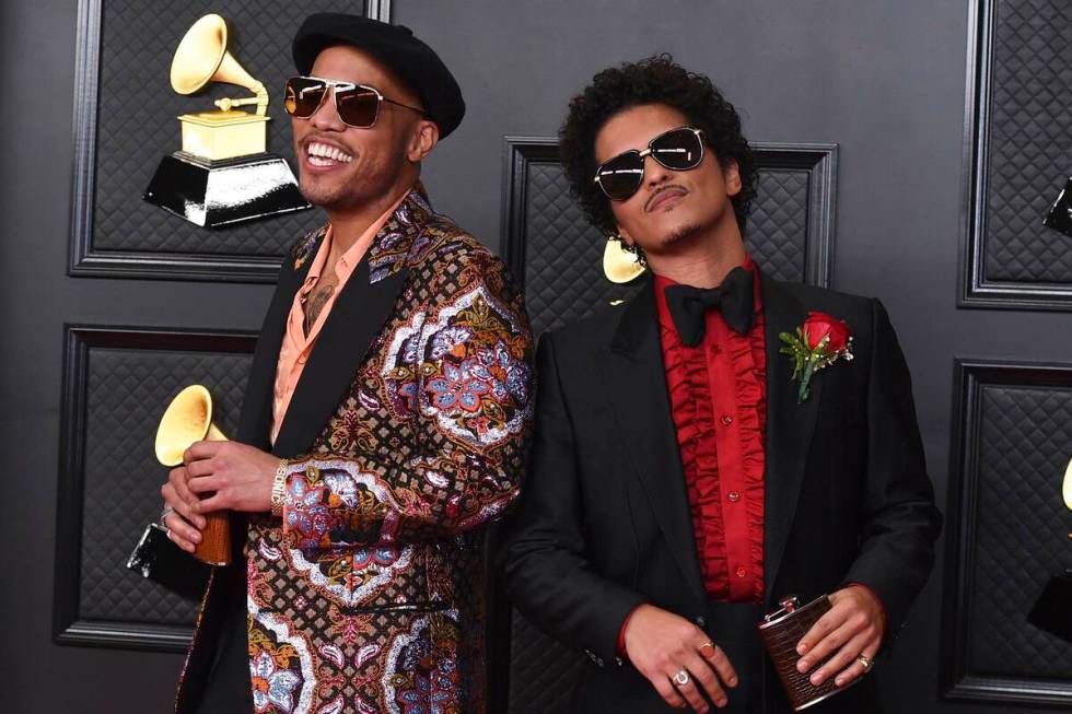Anderson .Paak, left, and Bruno Mars, of the duo Silk Sonic, appear at the 63rd annual Grammy A ...