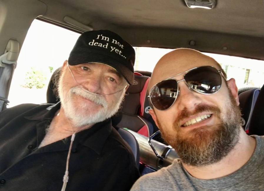 Bill Fayne is shown wearing his favorite hat alongside and his son, Jeremy. Bill Fayne died of ...