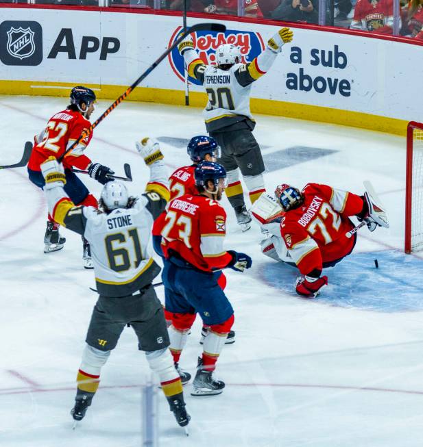 Golden Knights center Chandler Stephenson (20) celebrates a score past Florida Panthers goalten ...