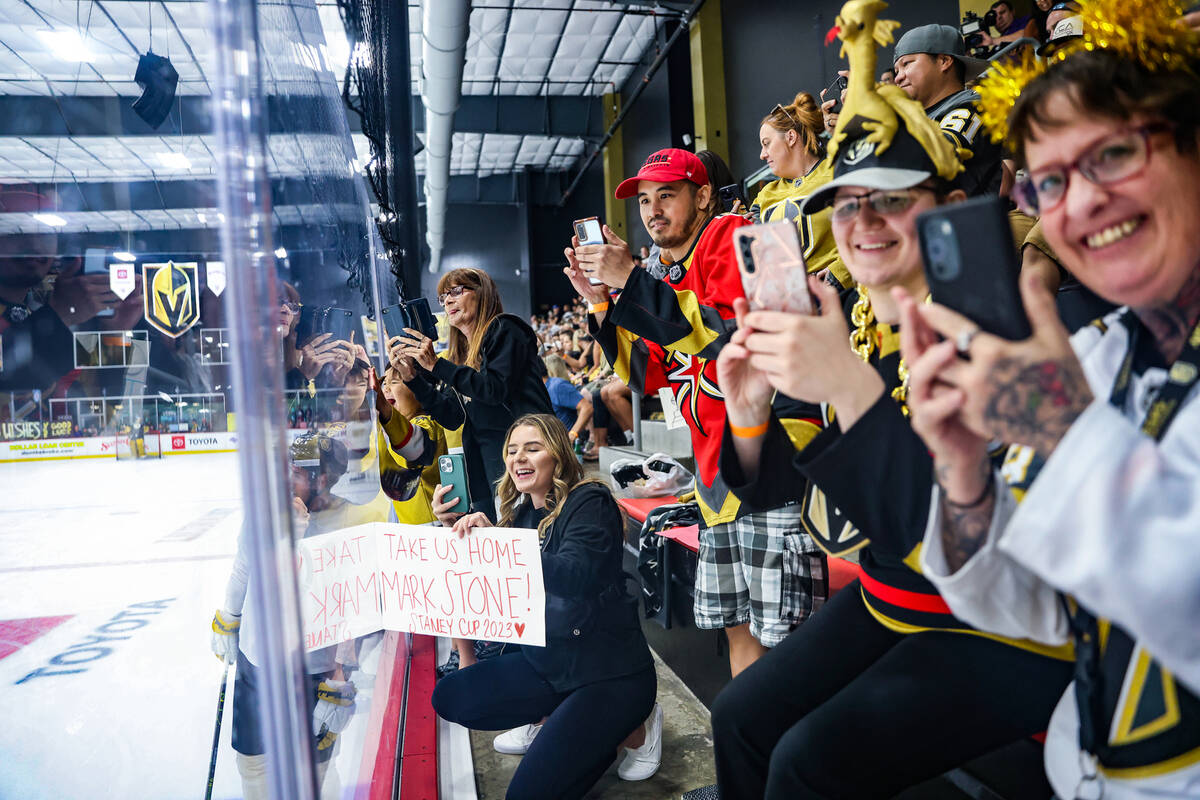 Fans cheer the Golden Knights at practice ahead of home game 5 of the Stanley Cup Finals agains ...