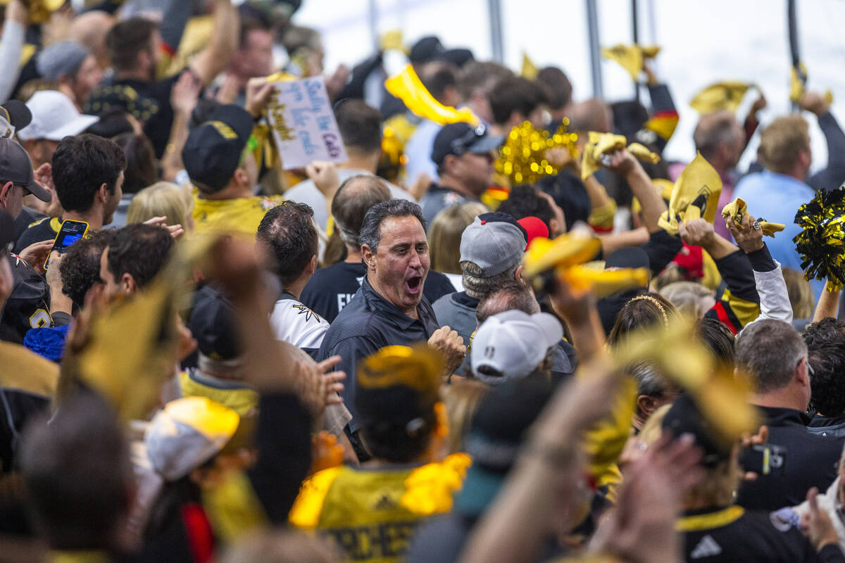 Golden Knights fans celebrate a score over Florida Panthers goaltender Sergei Bobrovsky (72) du ...