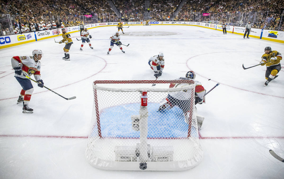 Golden Knights right wing Jonathan Marchessault (81) takes shot at Florida Panthers goaltender ...