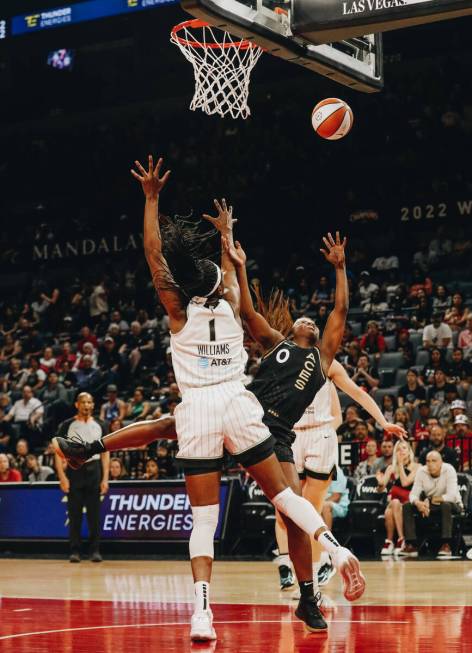 Aces guard Jackie Young (0) attempts to make a basket during a game against the Chicago Sky on ...