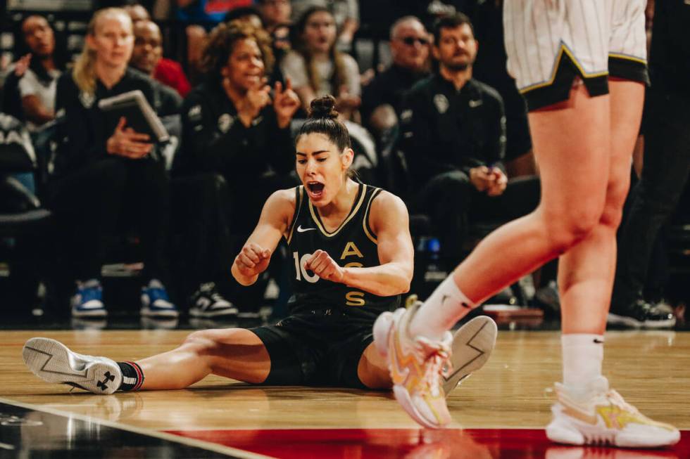 Aces guard Kelsey Plum (10) reacts after falling during a game against the Chicago Sky on Sunda ...