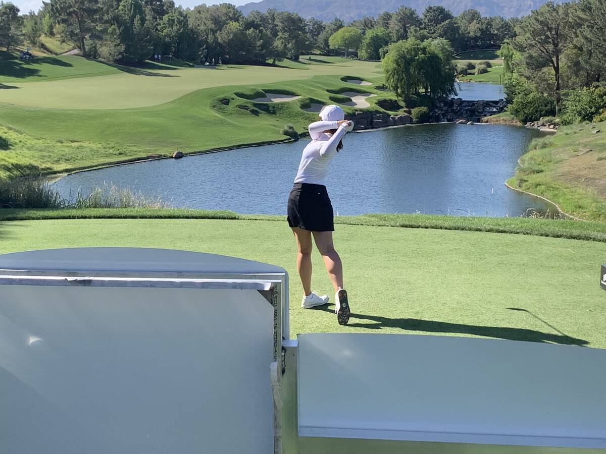 Players must clear water and choose a landing area for their tee shots on the 18th hole at Shad ...