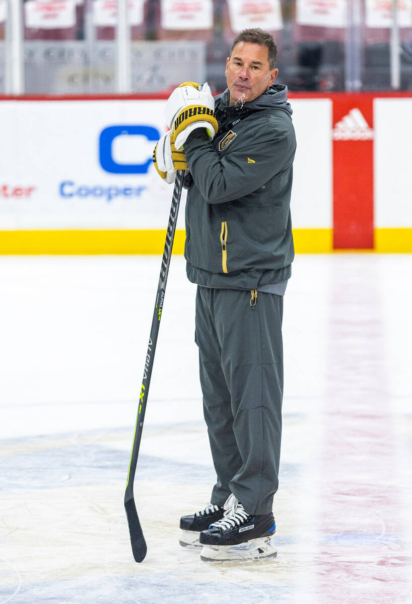 Golden Knights head coach Bruce Cassidy spits during the morning skate before Game 4 of the NHL ...