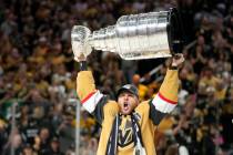 Golden Knights center William Karlsson skates with the Stanley Cup after the Knights defeated t ...