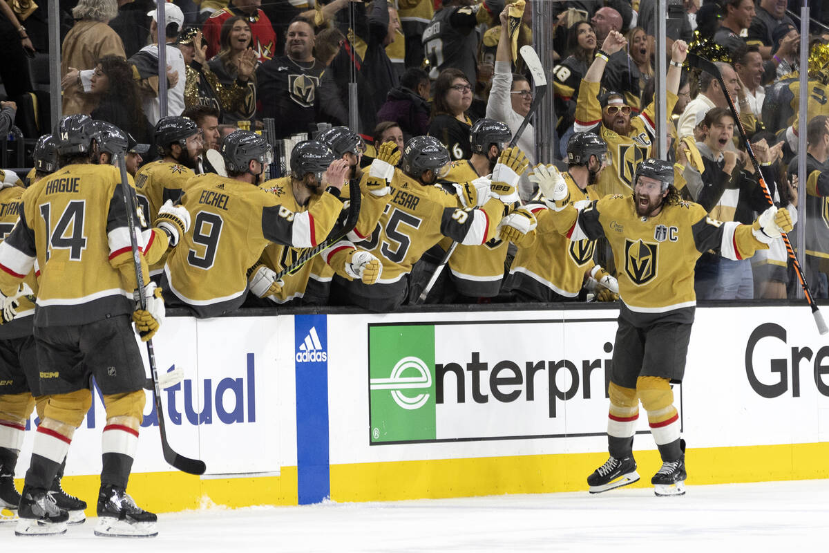 Golden Knights right wing Mark Stone (61) celebrates at the bench after his second goal of the ...