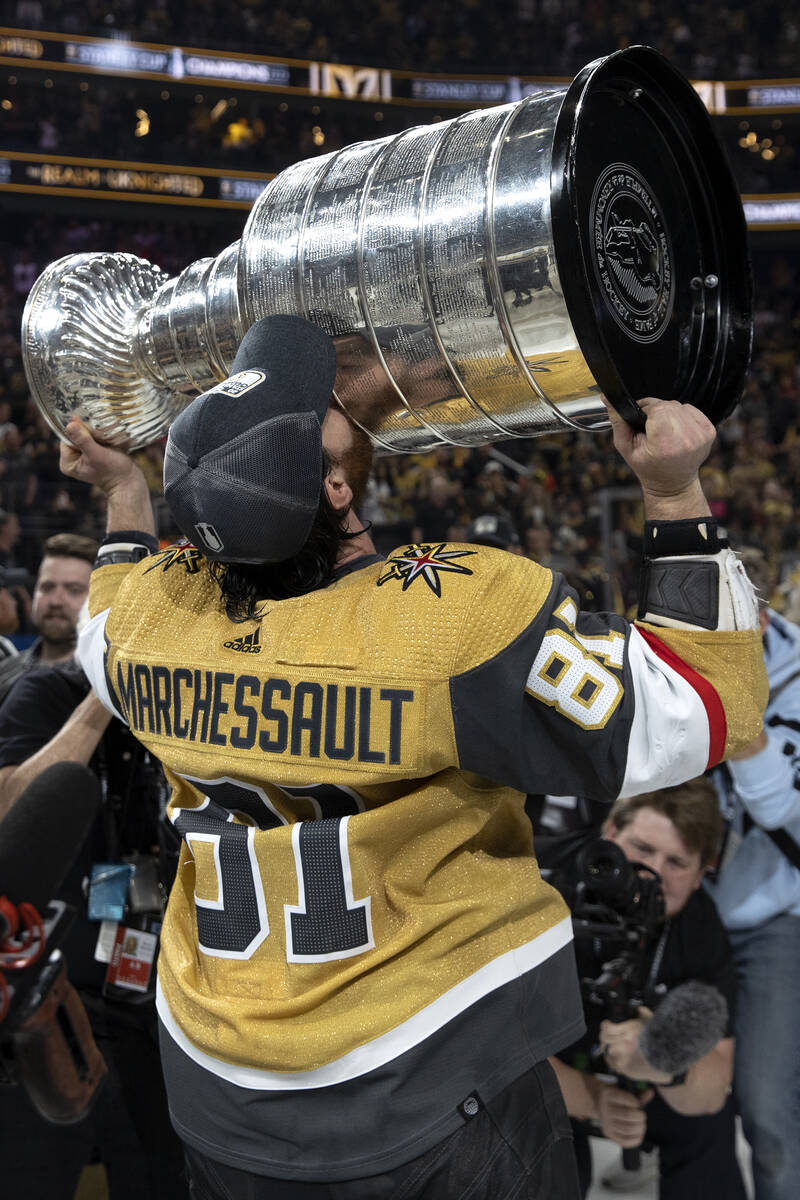 Golden Knights right wing Jonathan Marchessault (81) kisses the Stanley Cup after his team defe ...