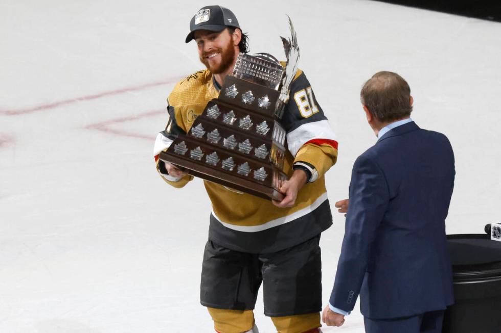 Vegas Golden Knights right wing Jonathan Marchessault hold the Conn Smythe Trophy after the Kni ...