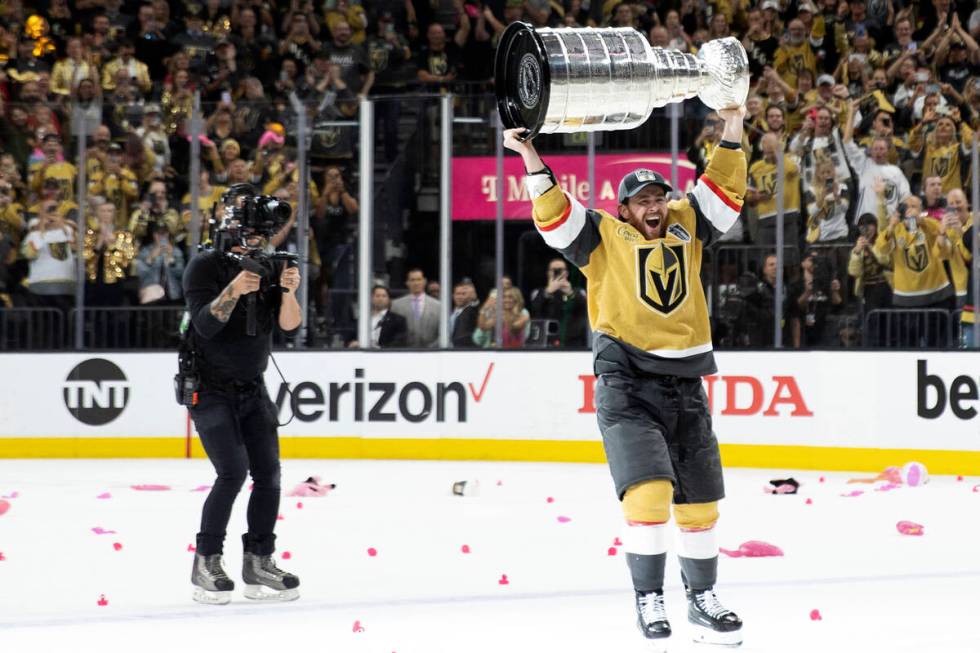 Golden Knights right wing Jonathan Marchessault celebrates with the Stanley Cup after his team ...