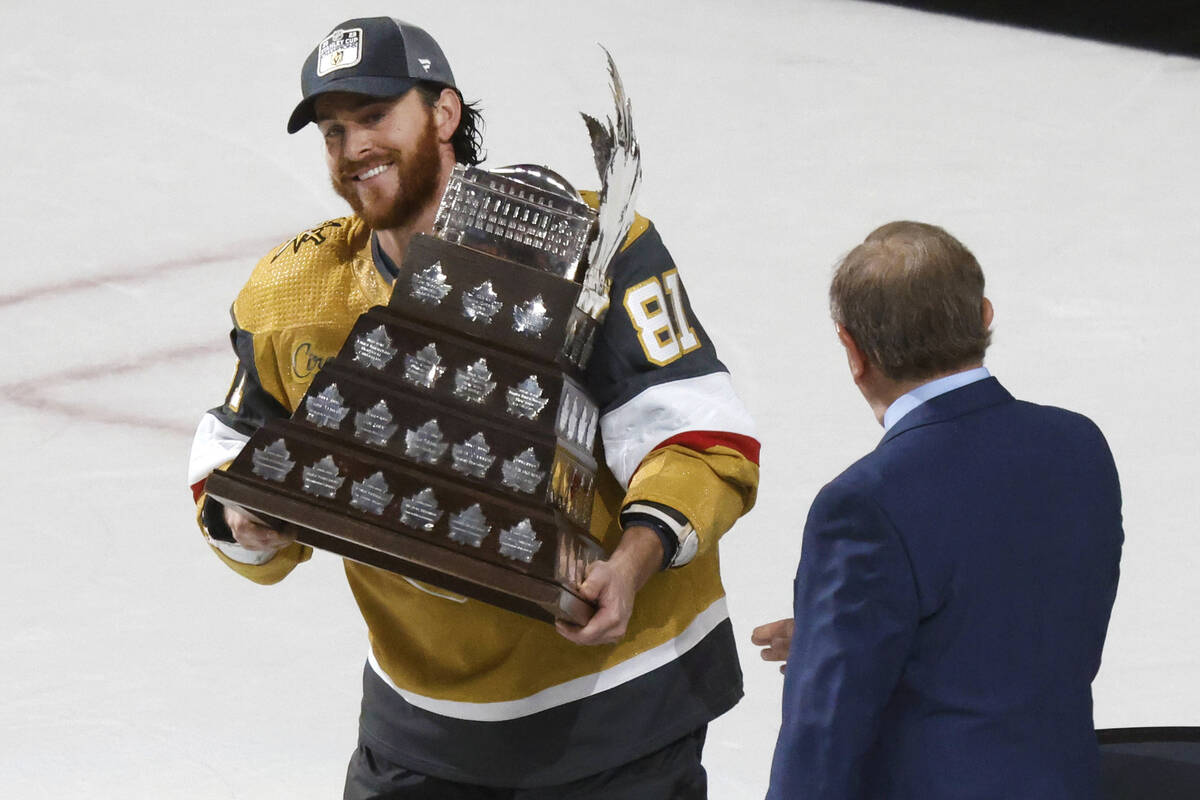 Vegas Golden Knights right wing Jonathan Marchessault hold the Conn Smythe Trophy after the Kni ...