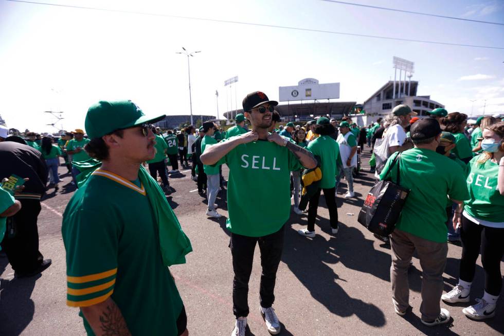 Fans stand outside Oakland Coliseum to protest the Oakland Athletics' planned move to Las Vegas ...