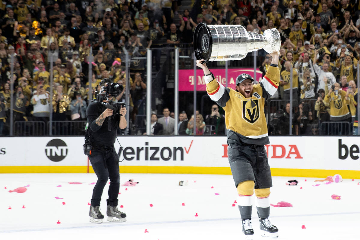 Golden Knights right wing Jonathan Marchessault celebrates with the Stanley Cup after his team ...