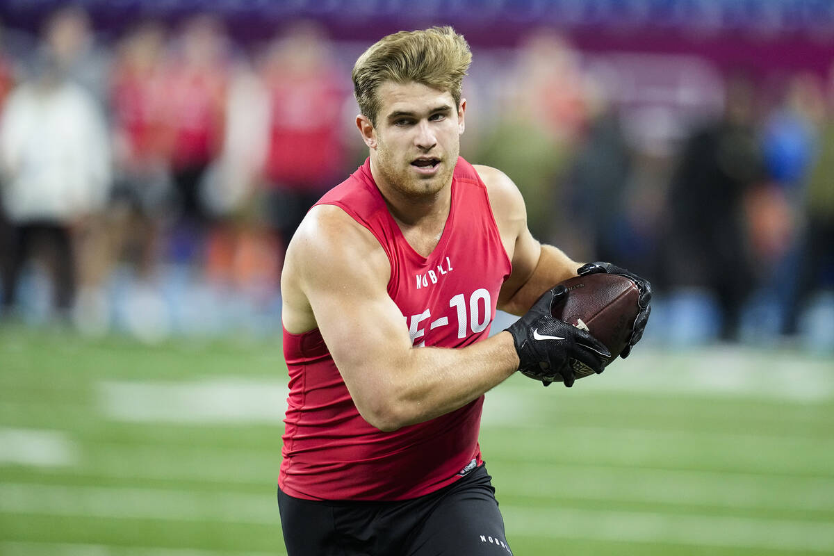Notre Dame tight end Michael Mayer runs a drill at the NFL football scouting combine in Indiana ...