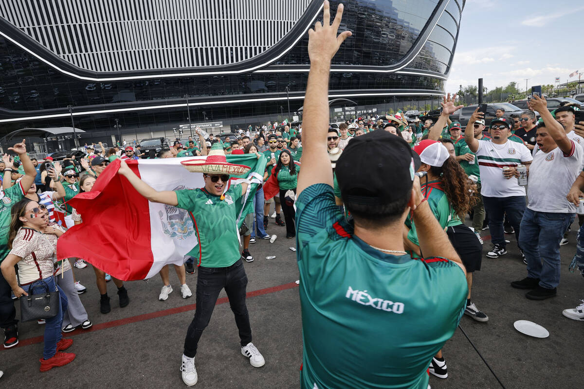 Mexico fans hold a concert outside the Allegiant Stadium, Thursday, June 15, 2023, before a CON ...