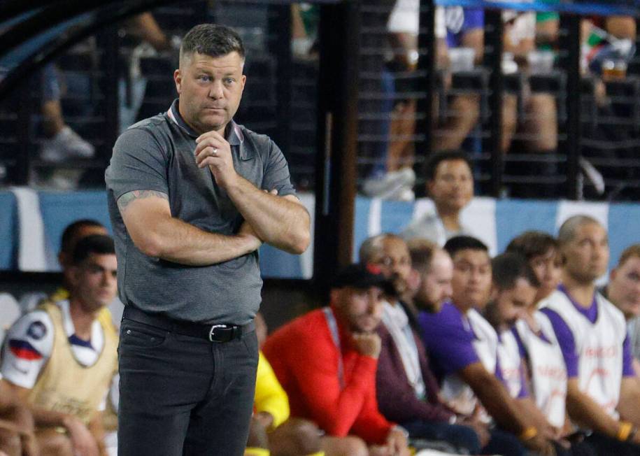 USA interim coach B.J. Callaghan watches his players during the second half of a CONCACAF Natio ...
