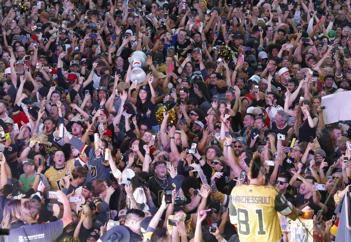 Golden Knights fans celebrate their team's Stanley Cup win against the Florida Panthers, outsid ...