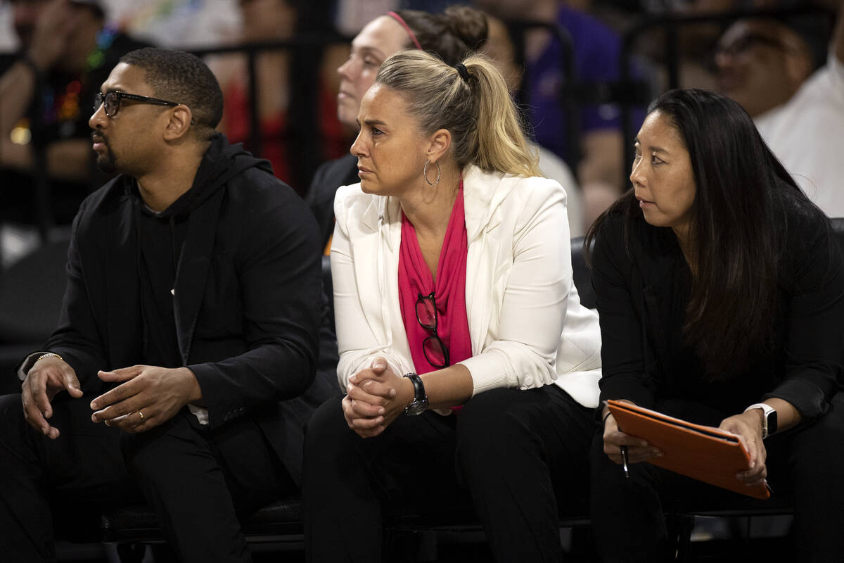 Las Vegas Aces assistant coach Tyler Marsh, head coach Becky Hammon and first assistant coach N ...