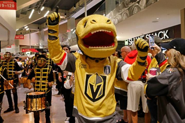 Golden Knights mascot Chance joins a march with the Knight Line before the Game 5 of the NHL ho ...