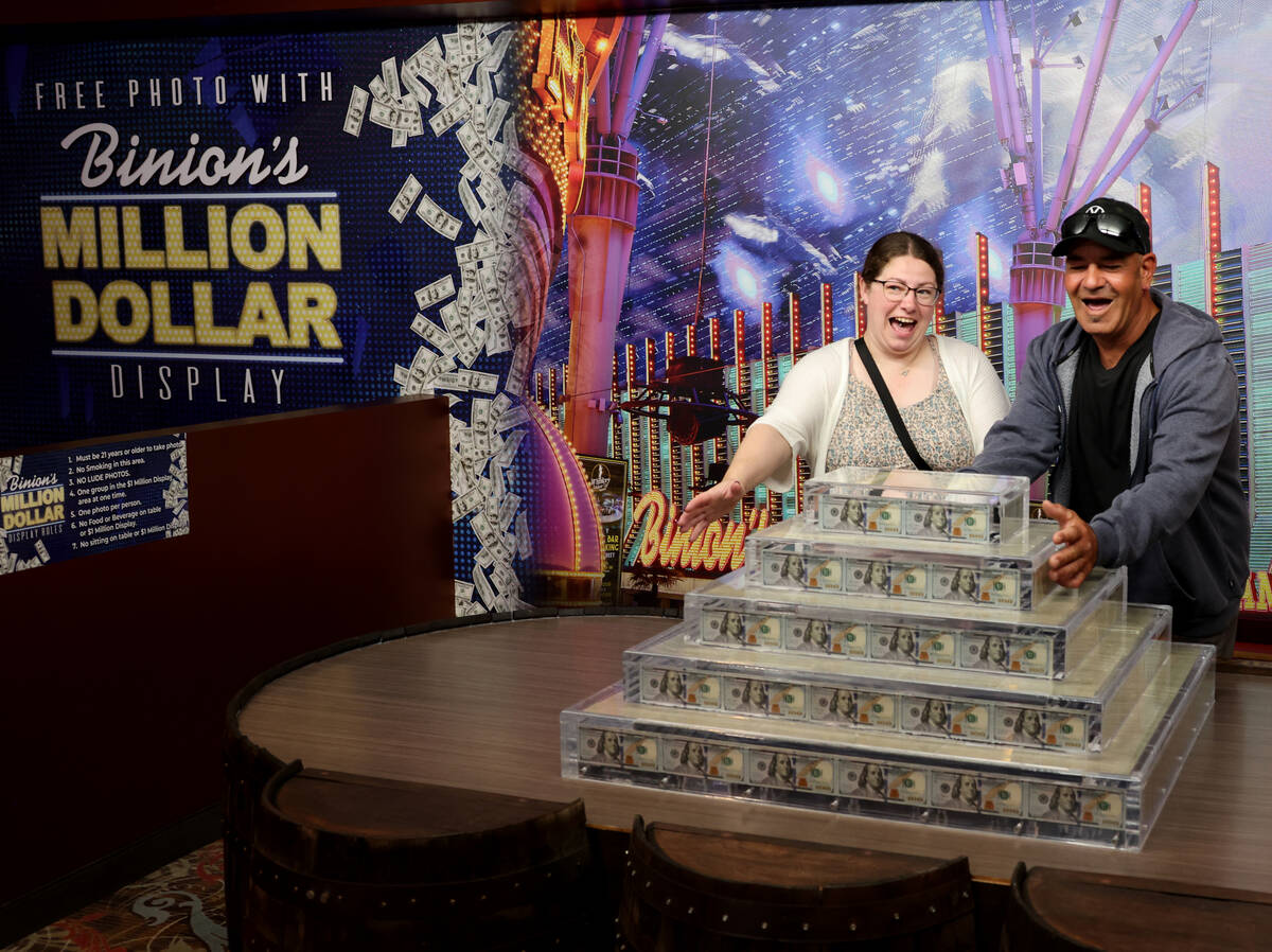 Laura and Tony Oliveira of Canada pose with the new Million Dollar Display at Binion's in downt ...