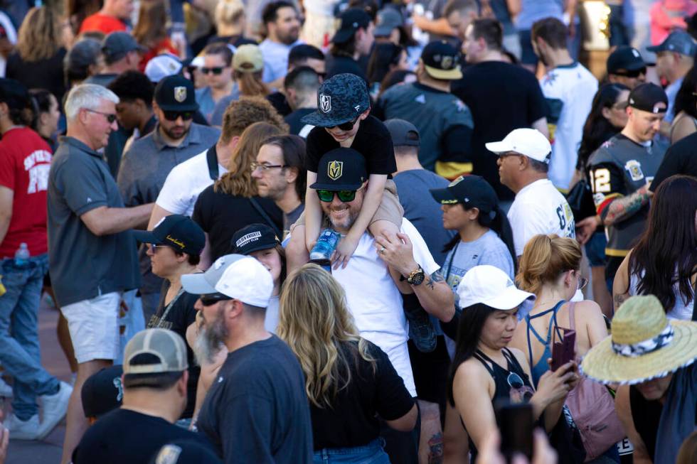 Fans crowd Toshiba Plaza before the Golden Knights parade down the Las Vegas Strip to celebrate ...