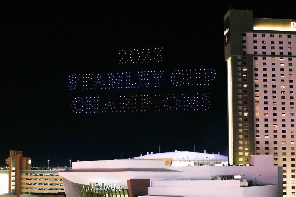 A drone light show is displayed above the T-Mobile Arena during the Vegas Golden Knights Stanle ...