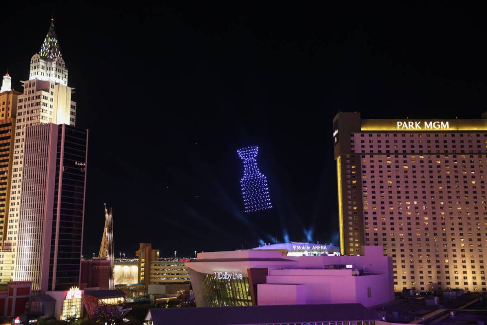 A drone light show is displayed above the T-Mobile Arena during the Vegas Golden Knights Stanle ...