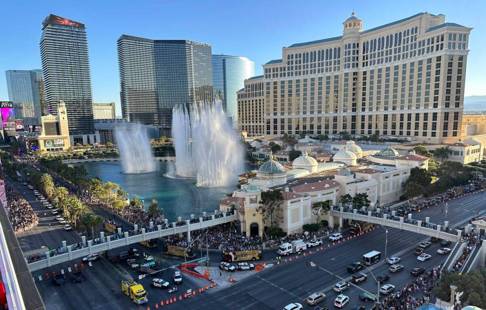 Fans cheer the Golden Knights’ Stanley Cup championship parade turns off Flamingo Road t ...