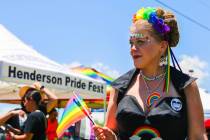 Sue Woods walks through the 3rd annual LGBTQ Henderson Pride Festival on Saturday, June 17, 202 ...