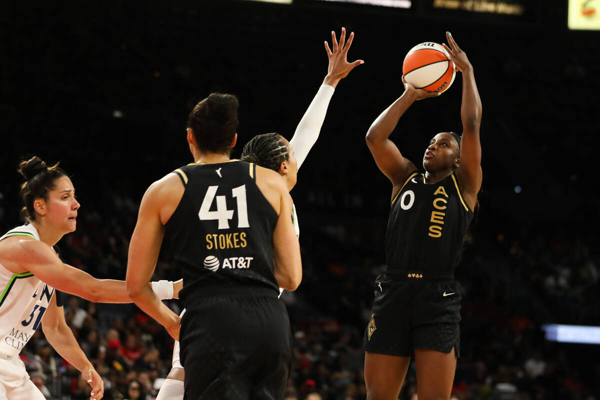 Las Vegas Aces guard Jackie Young (0) takes a shot during a game against the Minnesota Lynx on ...