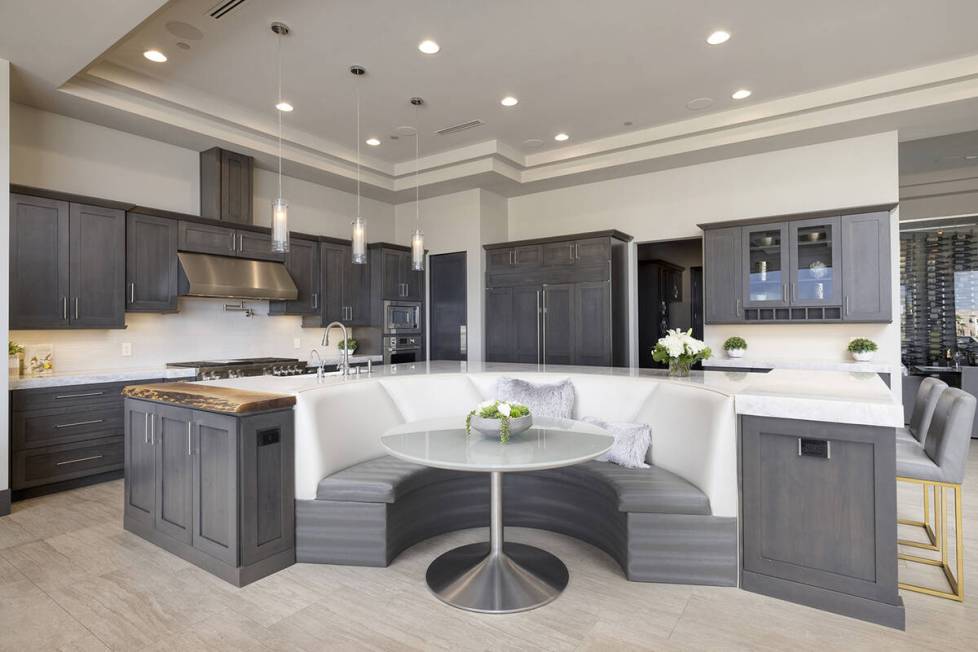 The gourmet kitchen features a large breakfast nook and a walk-in pantry. (Douglas Elliman of N ...