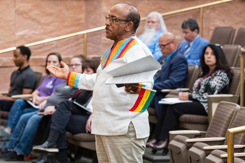 Girma Zaid, the Little Ethiopia project chair, reacts after lawmakers voted in the Clark County ...