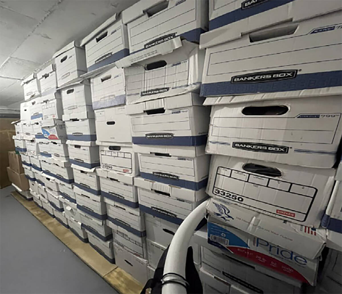In this handout photo provided by the U.S. Department of Justice, stacks of boxes in the storag ...