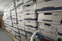 In this handout photo provided by the U.S. Department of Justice, stacks of boxes in the storag ...