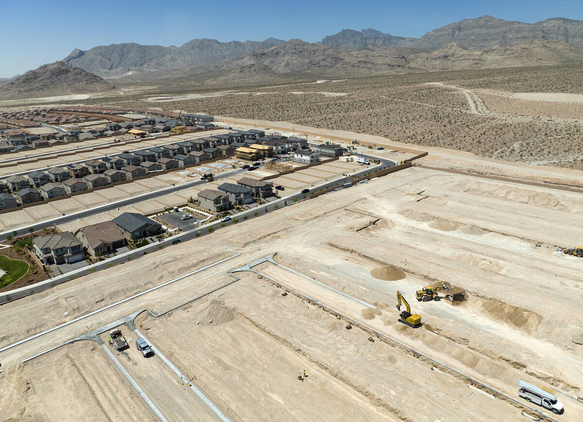 Aerial view of existing homes and housing construction sites in the northwest area of Las Vegas ...