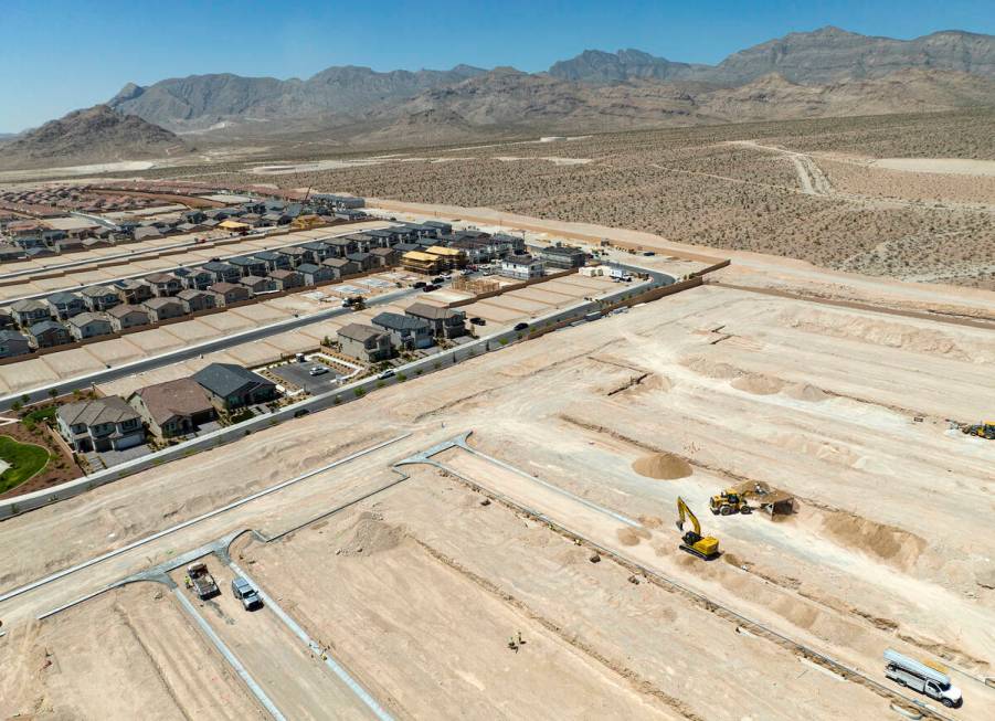 Aerial view of existing homes and housing construction sites in the northwest area of Las Vegas ...