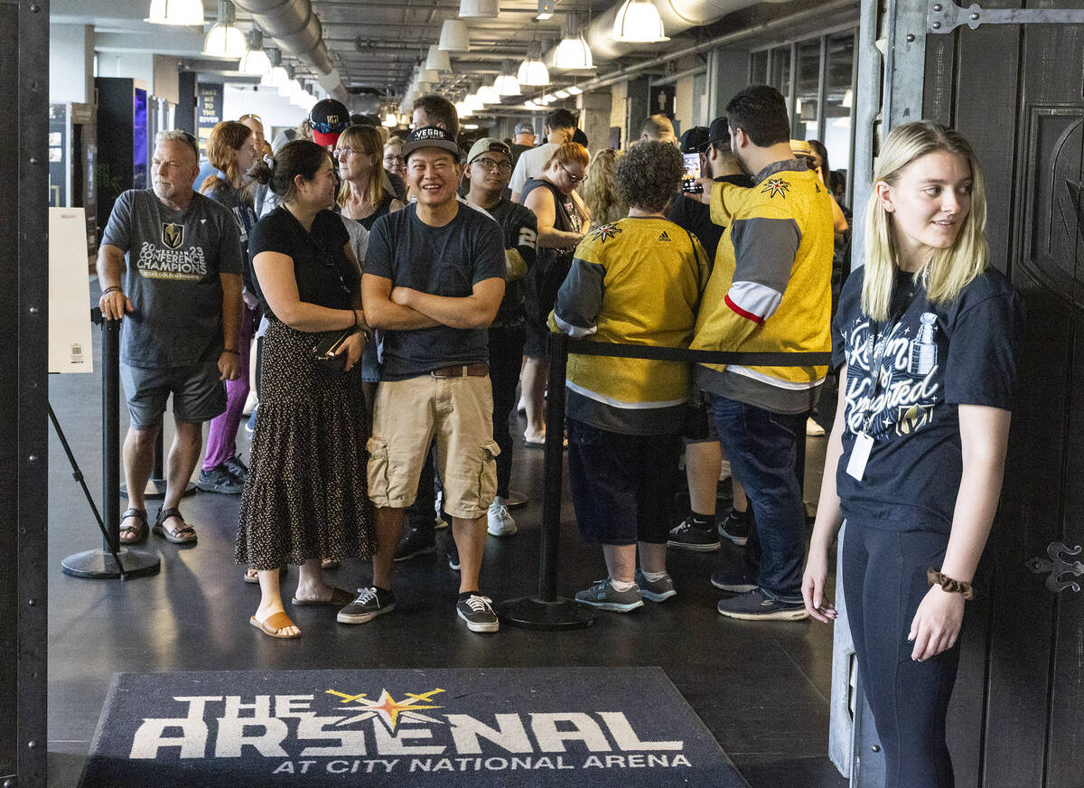 Golden Knights fans line up to buy Stanley Cup championship merchandise at The Arsenal at City ...