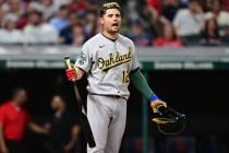 Oakland Athletics' Aledmys Diaz reacts after a pitch clock violation, resulting in a third stri ...