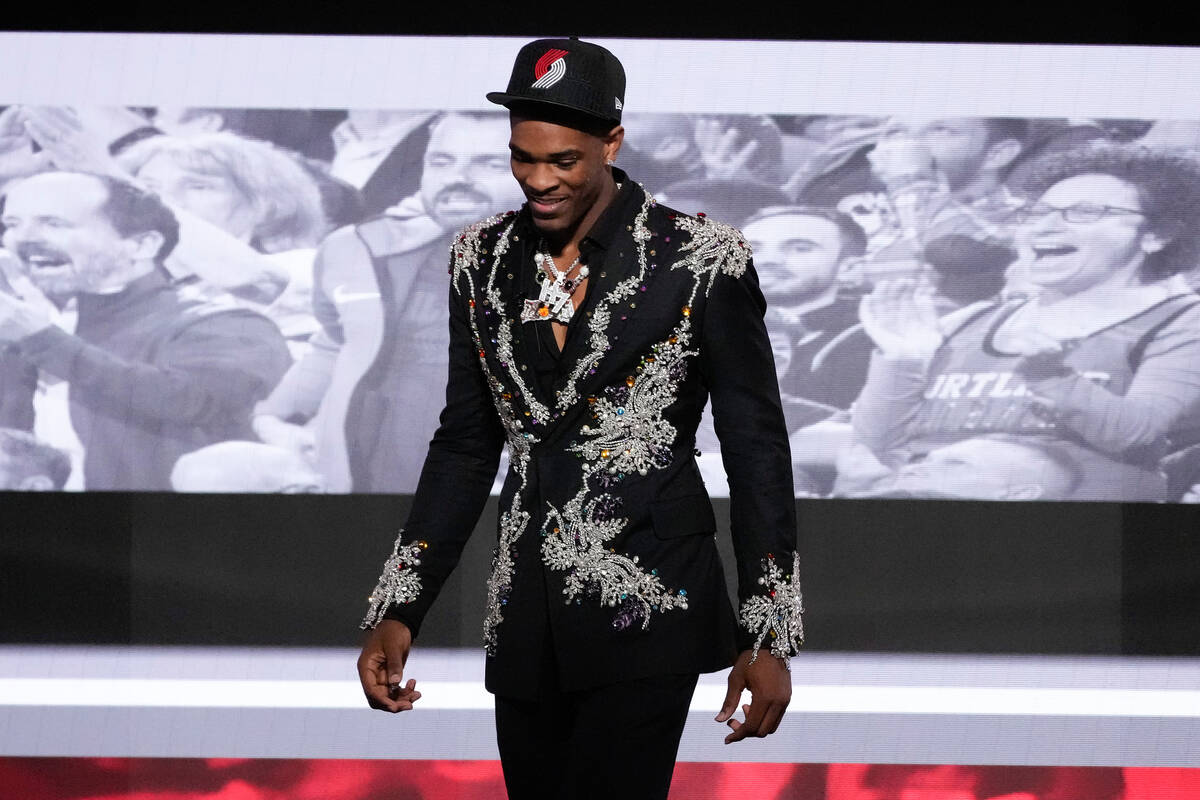 Scoot Henderson,reacts after being selected third overall by the Portland Trail Blazers during ...