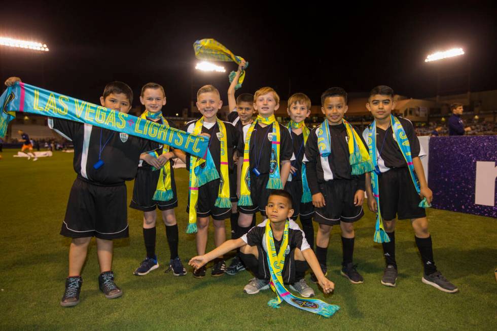 A youth soccer team gets a chance to get onto the field at a Las Vegas Lights FC game against S ...