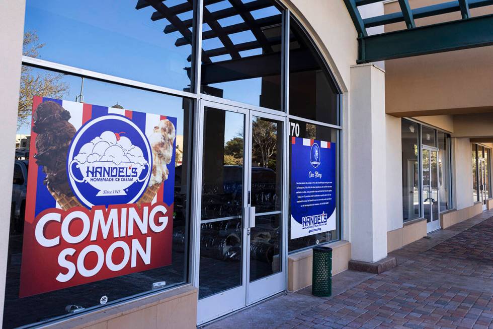 Construction crews work on a Handel's Ice Cream shop at the Crossroads Commons Center at 8975 W ...