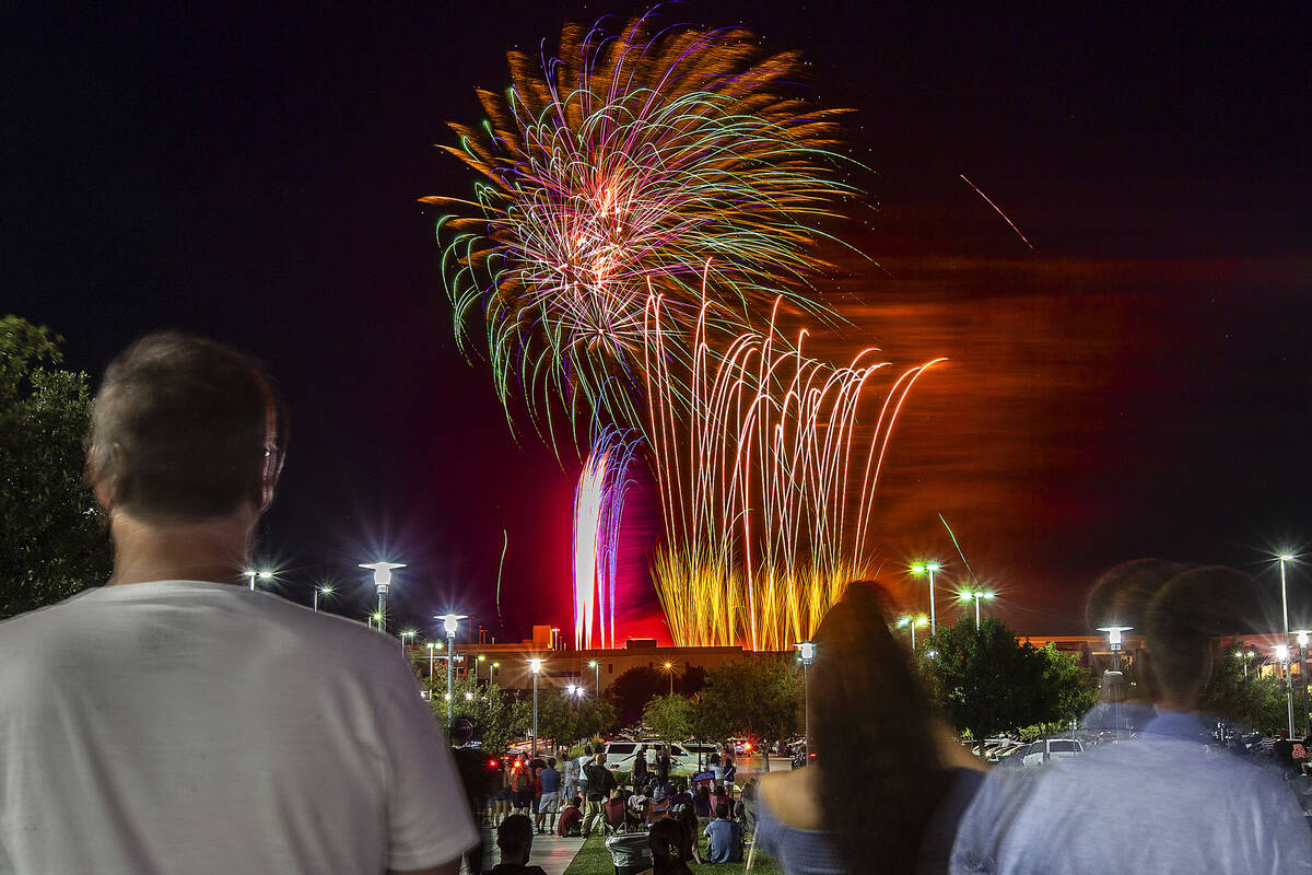 People watch the Red Rock Casino fireworks show from Downtown Summerlin on Saturday, July 4, 2 ...